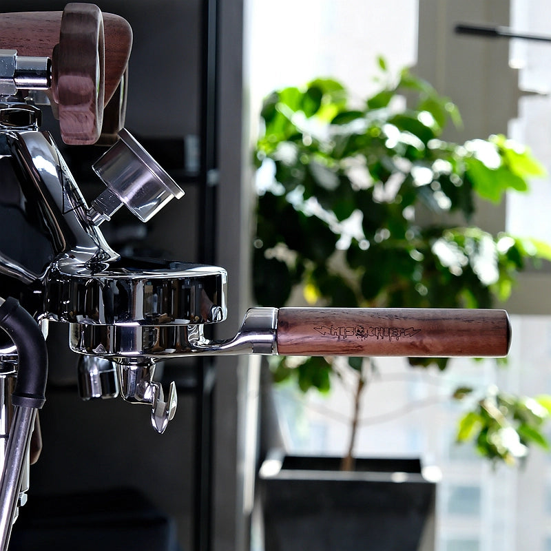 The Espresso Portafilter With Walnut Handle And Changeable Bottom