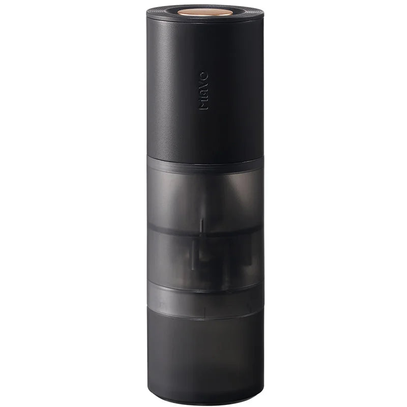 MAVO Aurora portable electric coffee grinder in black, semi-transparent grinding chamber and grounds bin, front view on white