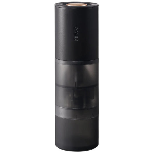 MAVO Aurora portable electric coffee grinder in black, semi-transparent grinding chamber and grounds bin, front view on white