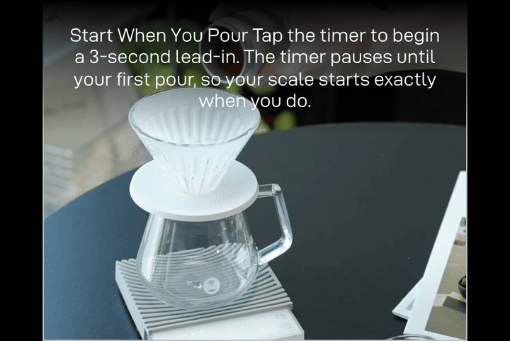 Start When You Pour: a pour-over dripper and glass server on the white Basic 3 — 'Tap the timer to begin a 3-second lead-in. The timer pauses until your first pour, so your scale starts exactly when you do.'