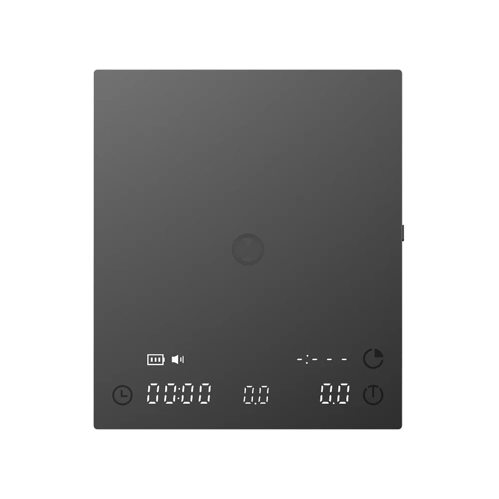 The black TIMEMORE Basic 3 with the silicone mat removed, showing the plain mirror-finish top panel and the touch controls along the front