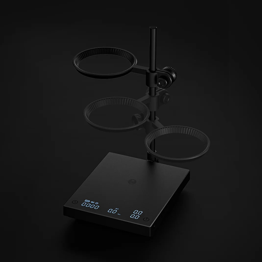 The DUO's dripper ring shown at several heights and swivel positions along the post against black