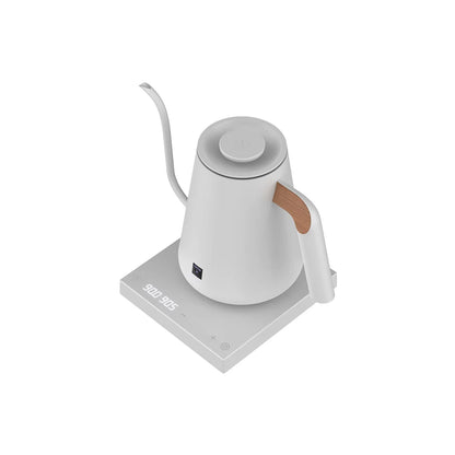 TIMEMORE Fish Pro X kettle three-quarter studio view on its power base, showing the 900 ml body and wooden thumb rest