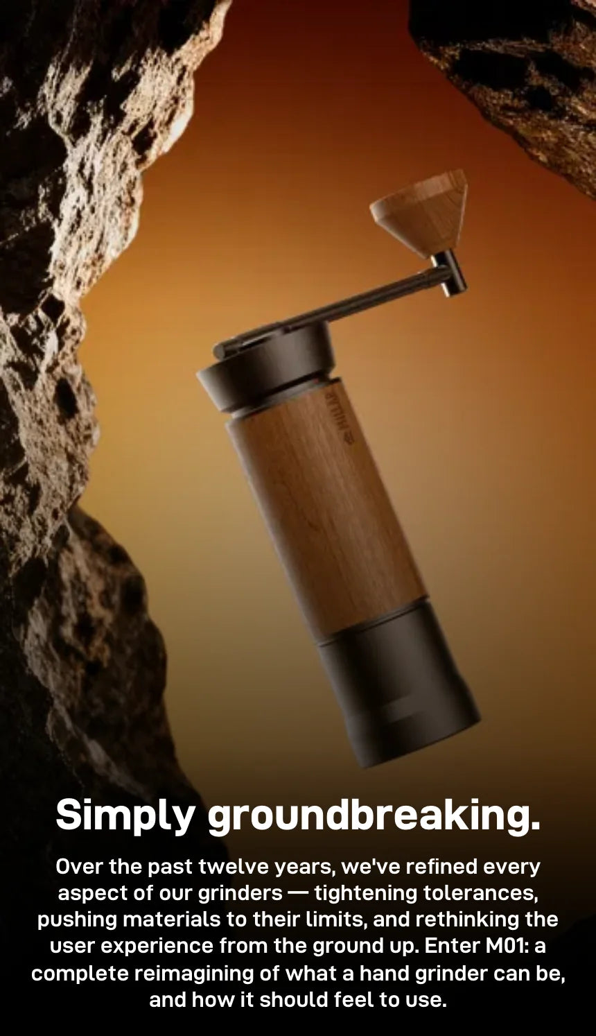 The black and walnut TIMEMORE x MILLAB M01 floating in an amber-lit cave opening above the headline 'Simply groundbreaking.' and TIMEMORE's intro: twelve years of refining grinders, tighter tolerances and materials pushed to their limits, reimagined as the M01 hand grinder