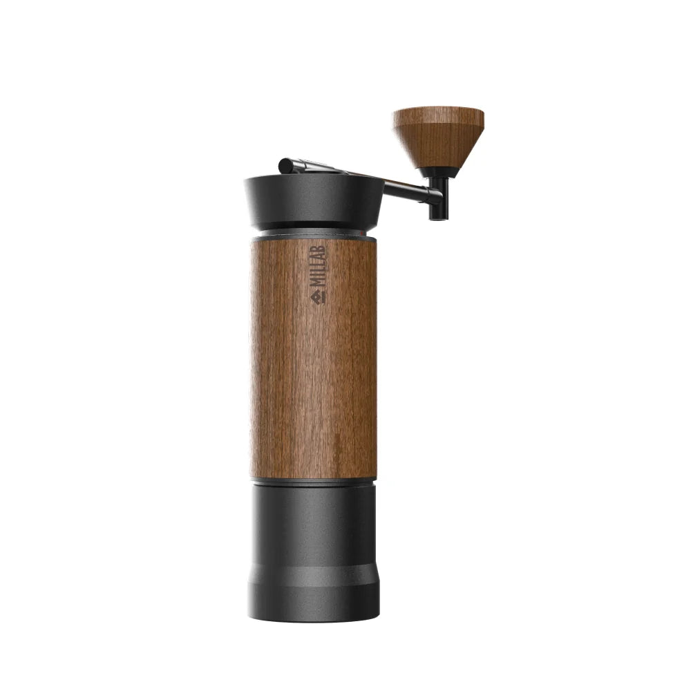 The black and walnut M01 hand grinder at an angle on a white background, showing the straight crank arm and walnut knob