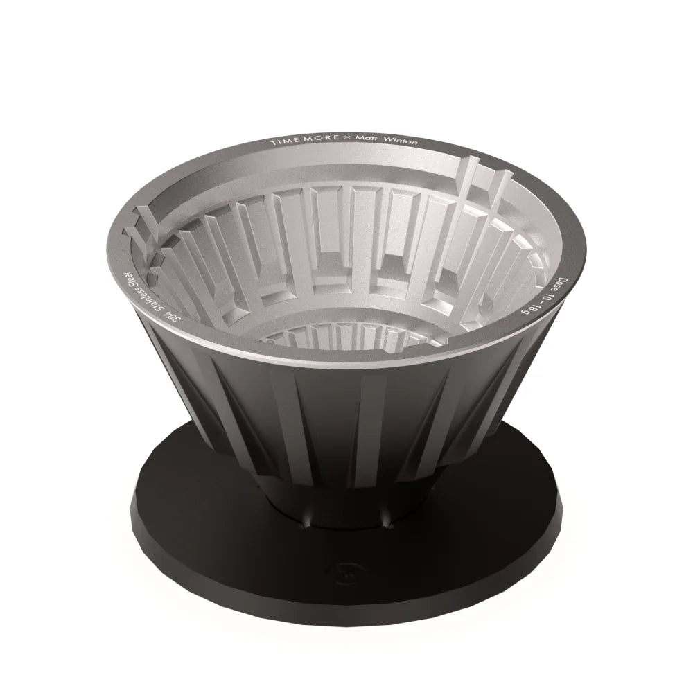 TIMEMORE x Matt Winton Crystal Eye VECTOR dripper in black, three-quarter view showing the 304 stainless steel Brewer Core inside the black Thermal Sleeve on its round base